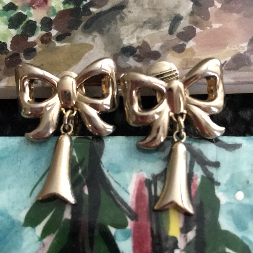 Vintage Monet gold bow dangle clip-on earrings